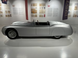 Sleek silver convertable car in the Italian Car Museum.